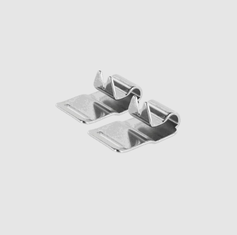 Metallic clip on a light gray background